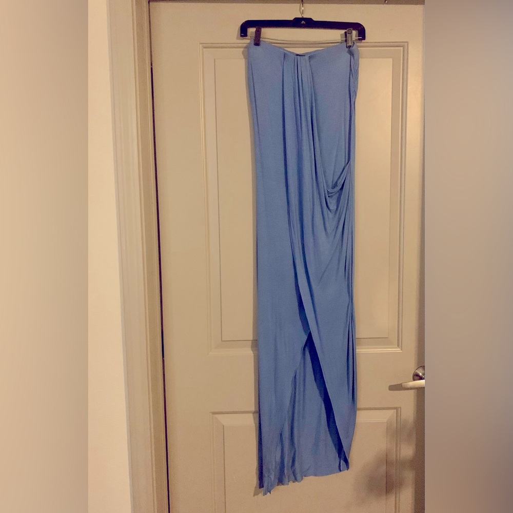 Love Ari Beautiful 1/2 shoulder Dress with slit in the the front .